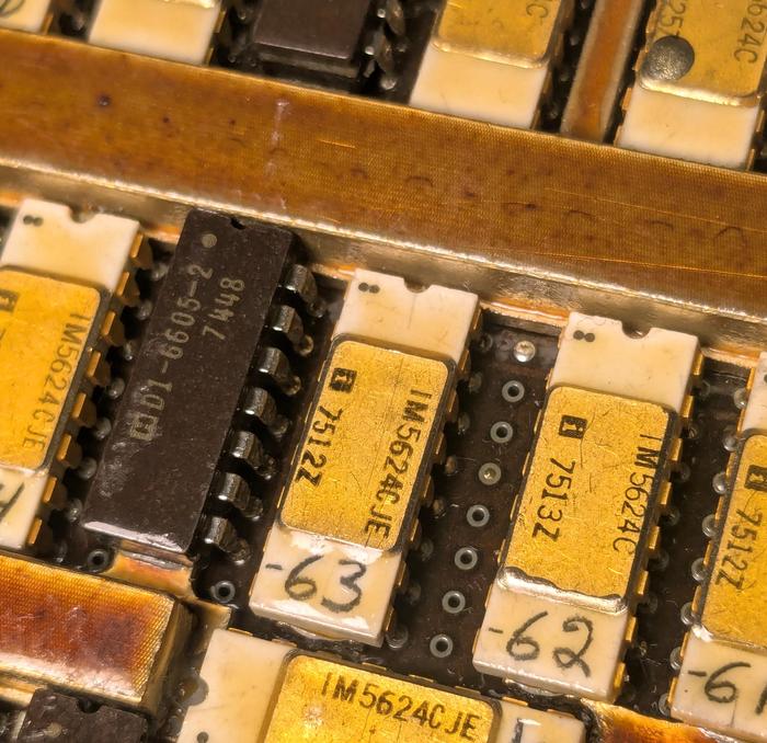 A close-up of the PROM page, showing how the chips are mounted. The black chips are much thicker than the white chips.
