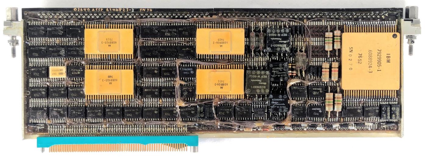 The network interface page, called the MIA (Multiplex Interface Adapter).
The page has extensive rework; thin brown "bodge" wires snake around the page to
repair errors or implement updates.
