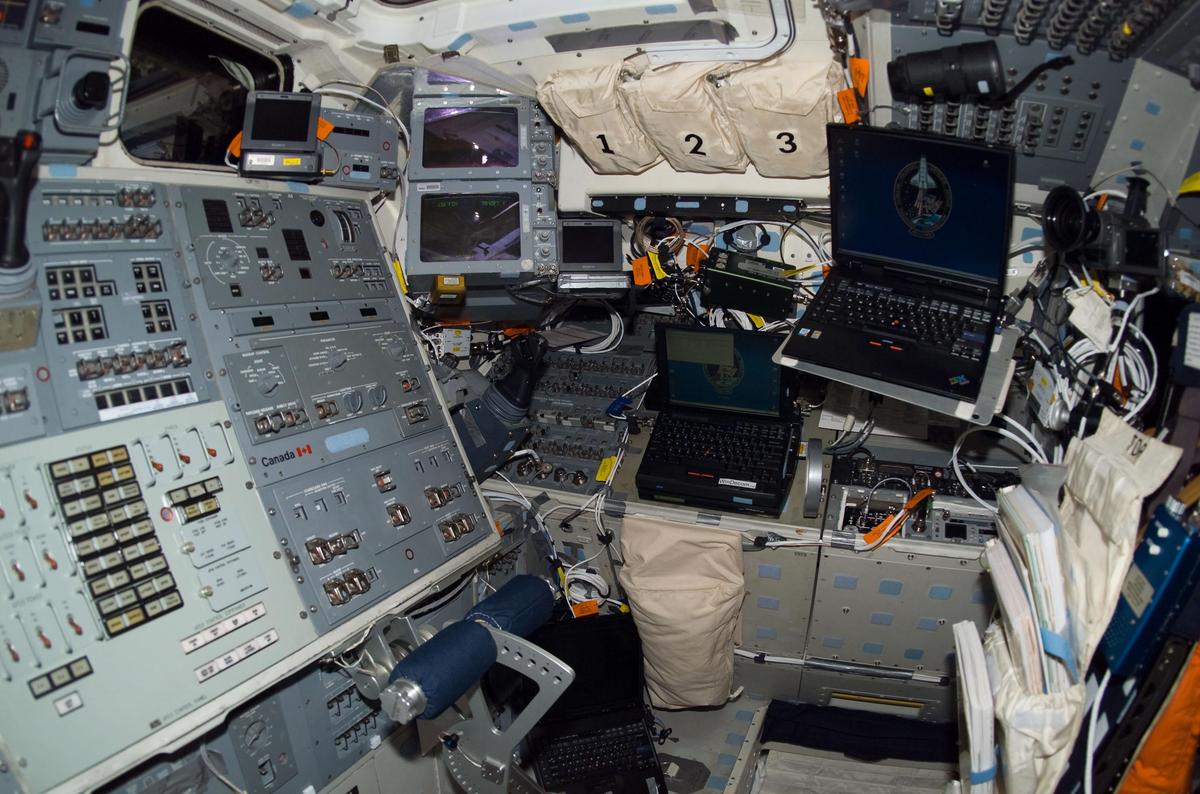 The aft flight deck of Discovery during STS-116. From National Archives.