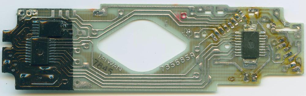 The exposure control circuit board, manufactured by Texas Instruments. Photo from openSX70.