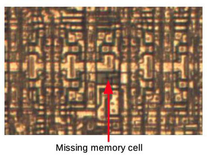 Memory cells, showing a gap where one cell is missing. Die photo from siliconpr0n.