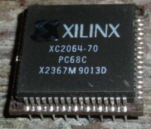 The Xilinx XC2064 was the first FPGA chip. Photo from siliconpr0n.